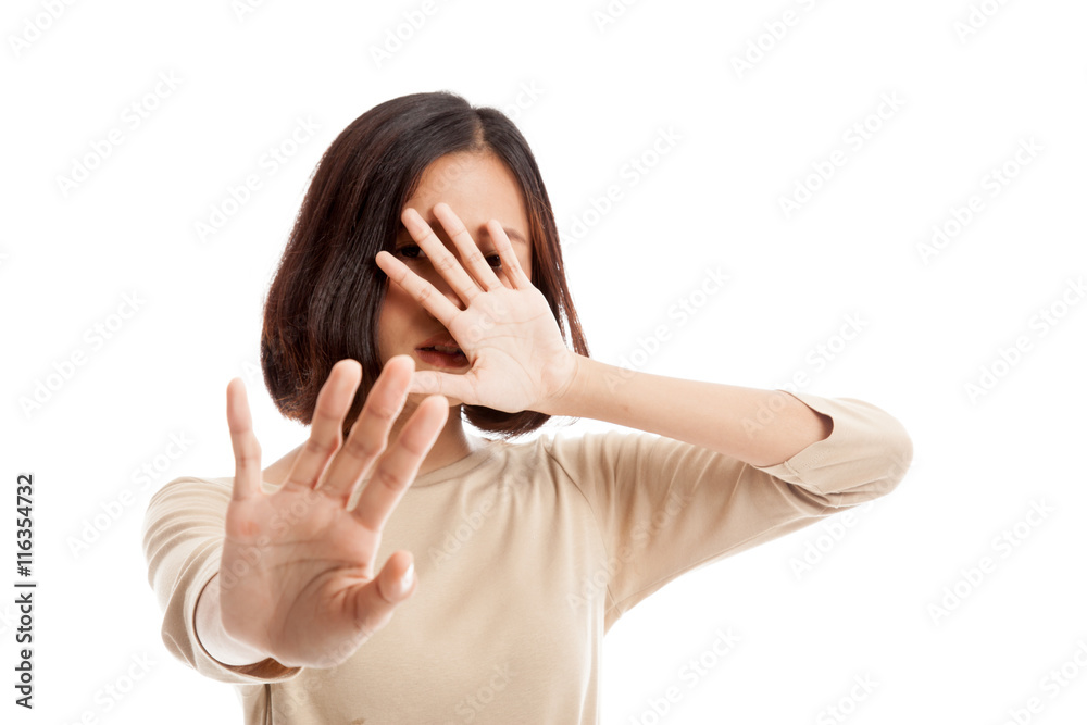 Young Asian woman hide her face isolated on white background Young Asian woman hide her face isolated on white background