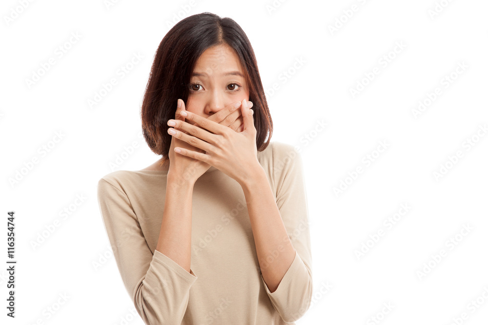 Beautiful young Asian woman close her mouth isolated on white background Beautiful young Asian woman close her mouth isolated on white background