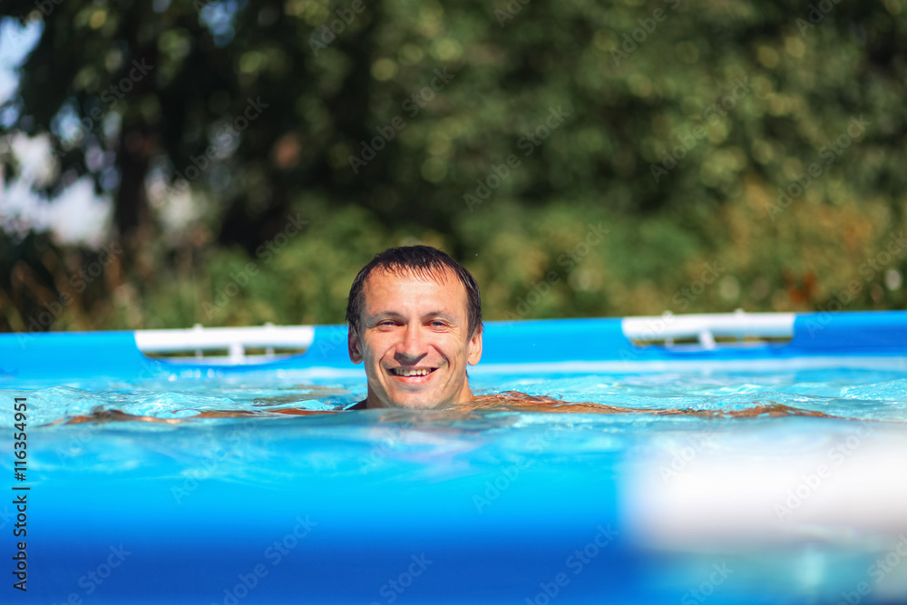 Man swim in pool.