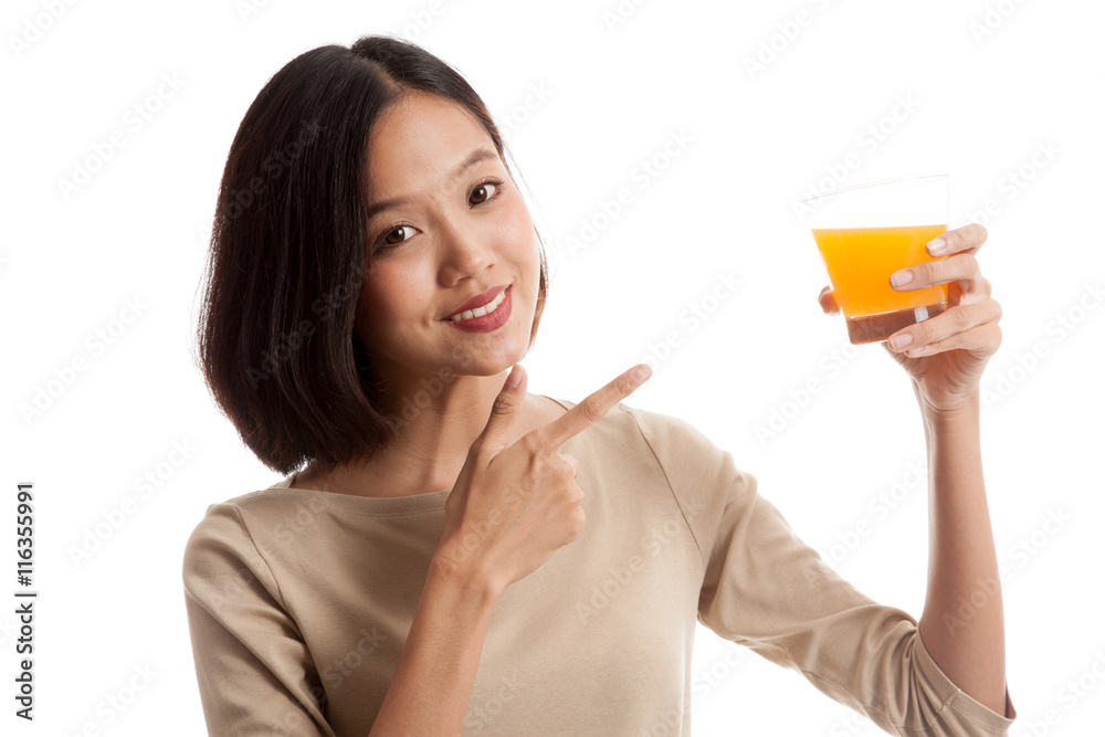 Young Asian woman point to orange juice isolated on white background Young Asian woman point to orange juice isolated on white background