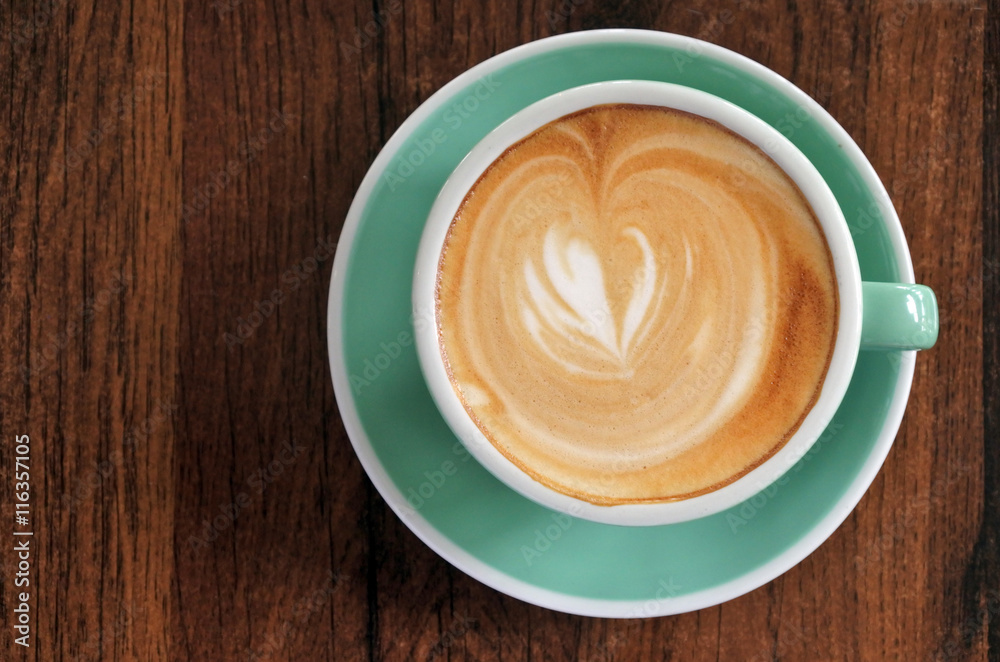 Flat lay view of a flat white cup of coffee drink Flat lay view of a flat white cup of coffee drink
