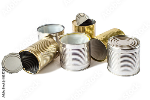 Used metal cans on a white background. Waste management.