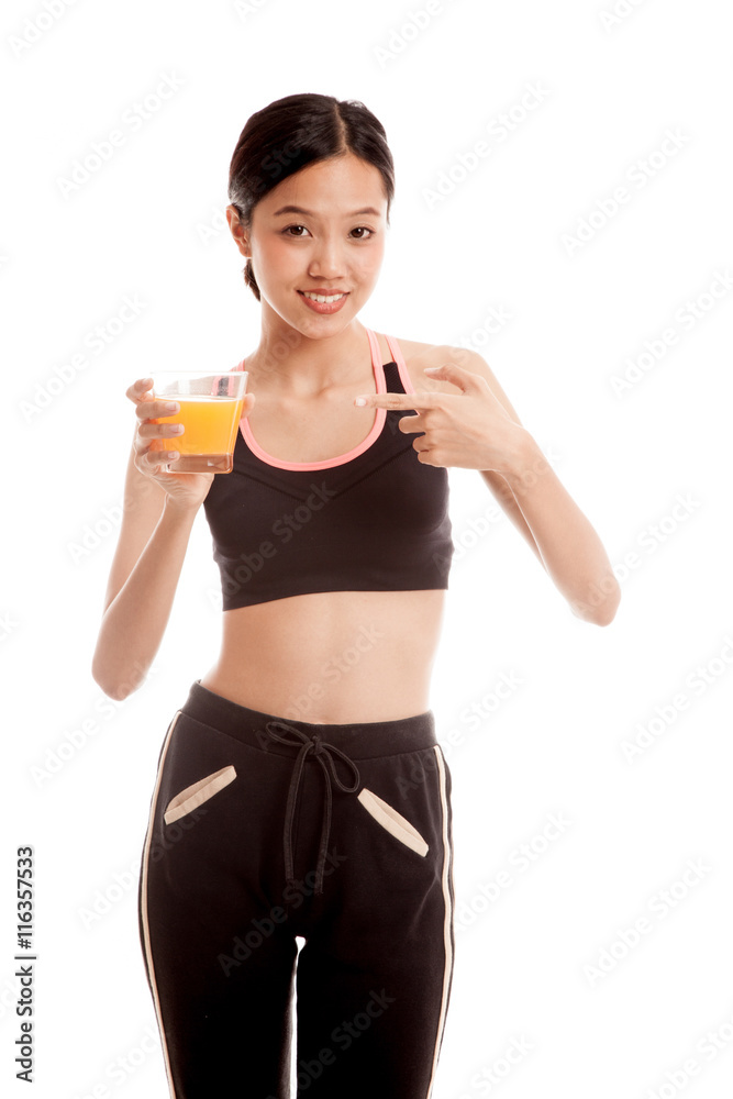 Beautiful Asian healthy girl point to orange juice isolated on white background Beautiful Asian healthy girl point to orange juice isolated on white background
