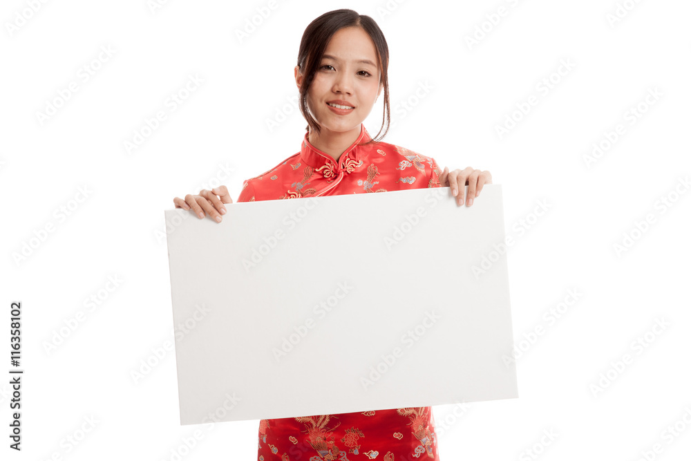 Asian girl in chinese cheongsam dress with blank sign Asian girl in chinese cheongsam dress with blank sign