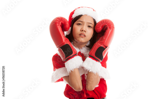 Asian Christmas Santa Claus girl with boxing glove isolated on white background