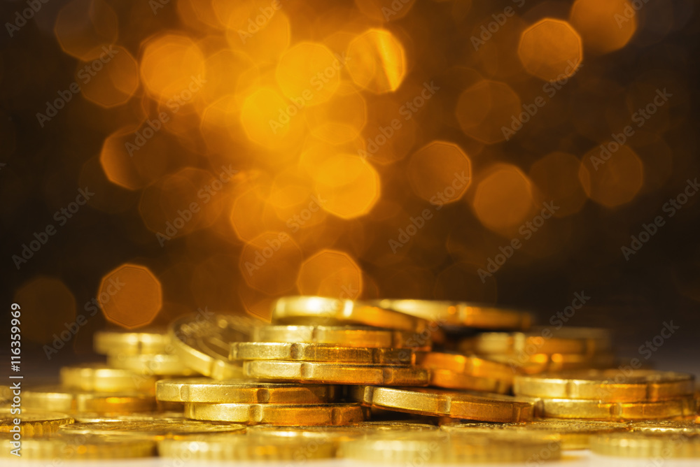 Euro coins against yellow defocused lights Euro coins against yellow defocused lights