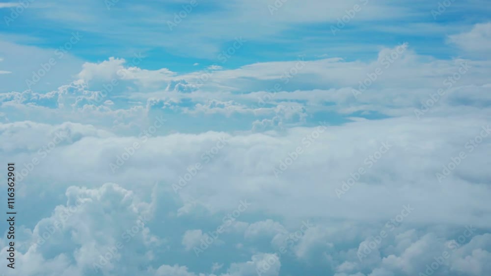 Video FullHD - Clouds in the sky - view through glass of aircraft window Video FullHD - Clouds in the sky - view through glass of aircraft window