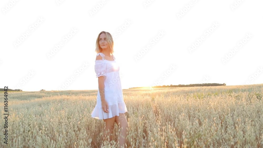Beauty Smiling Girl on the golden Field. Laughing And Happy young model woman Beauty Smiling Girl on the golden Field. Laughing And Happy young model woman