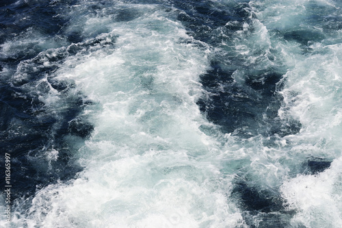 water wave splash after ship propeller