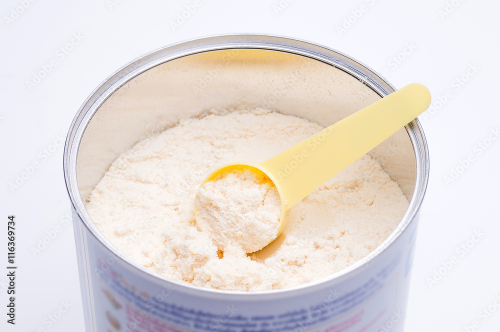 Baby milk powder in cans that open with a spoon. Baby milk powder in cans that open with a spoon.