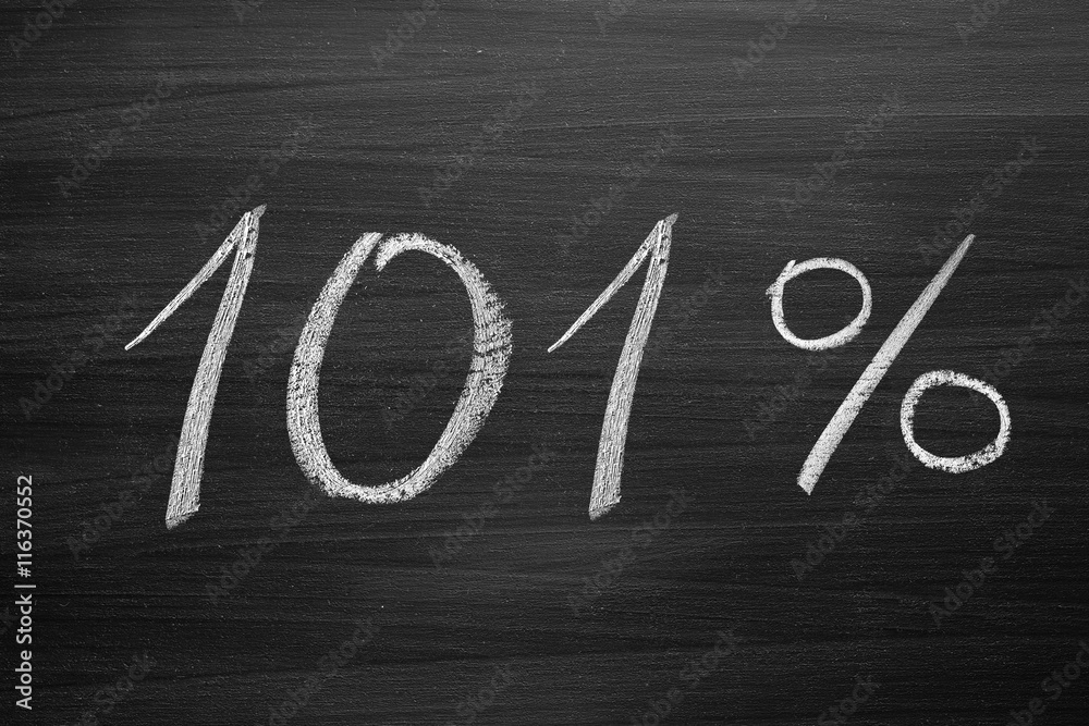 101 percent header written with a chalk on the blackboard Stock Photo