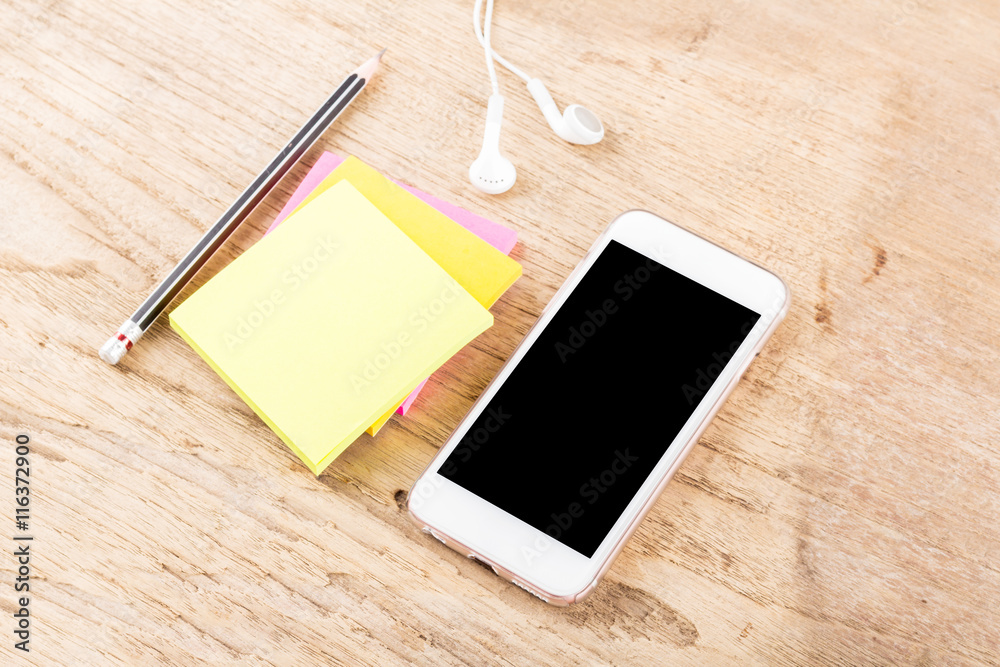 Mobile phone on wood table background, clipping path inside Mobile phone on wood table background, clipping path inside