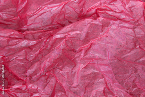 This is a photograph of Red tissue paper background