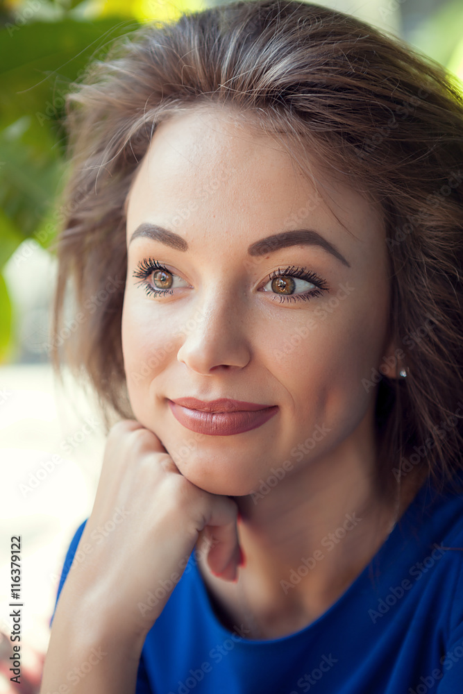 Portrait of beautiful woman in natural light