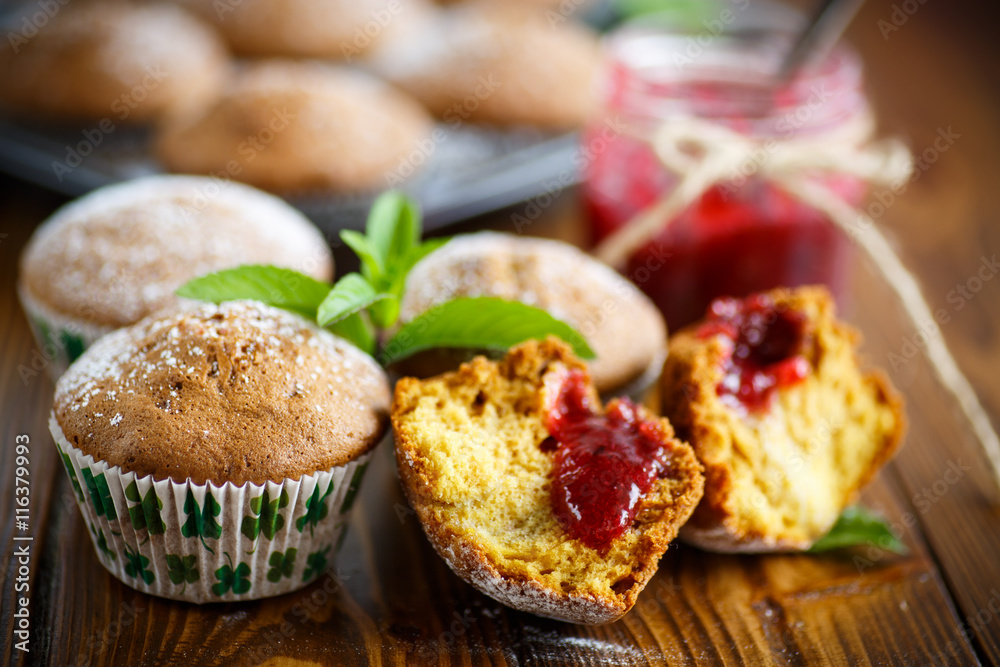 sweet baked muffins with jam inside