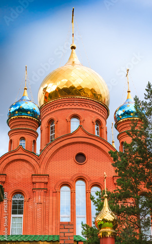 bright domes of the Orthodox Church against the clear blue sky