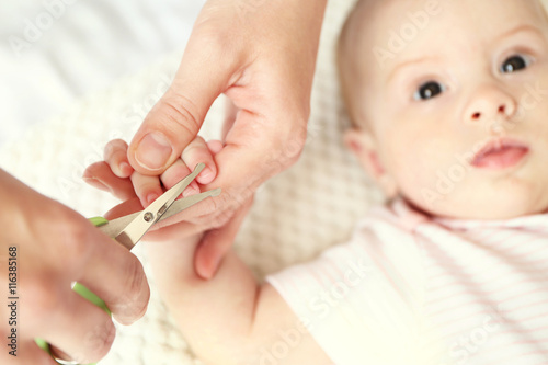Cutting baby nails  closeup