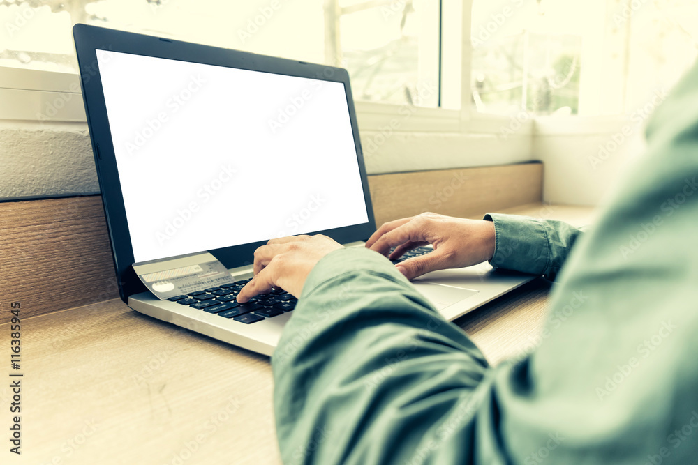 Fototapeta premium woman shopping online with laptop and credit card