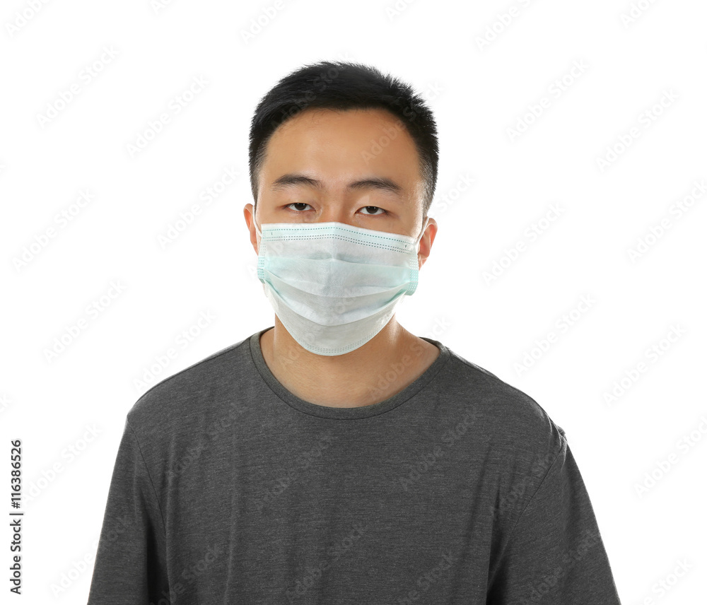 Ill man wearing mask isolated on white Ill man wearing mask isolated on white