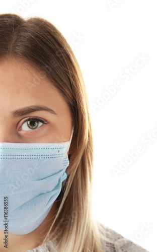 Ill woman wearing mask isolated on white  close up