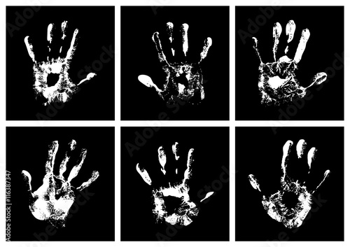 Set of vector white hand print on black background.