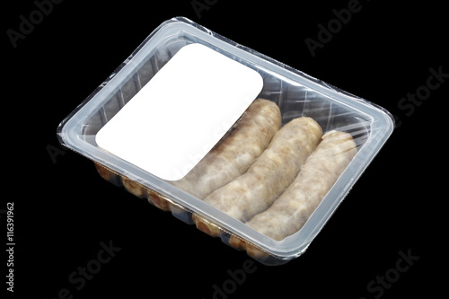 kupaty (bratwursts) in modified atmosphere packaging (MAP) on the black background 
