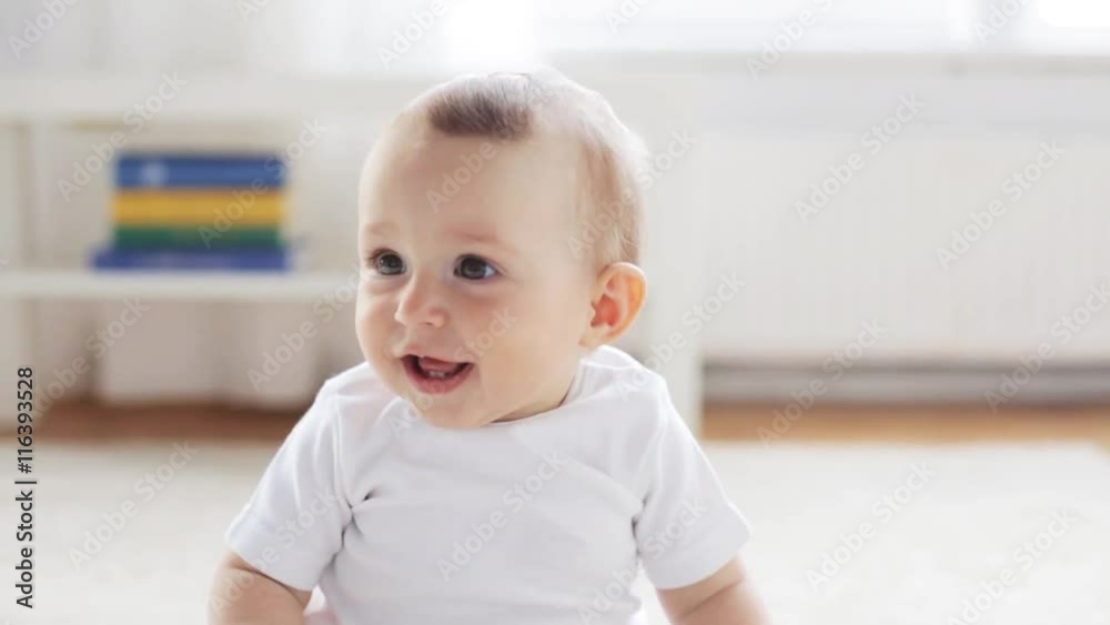 happy little baby sitting in living room at home 11 happy little baby sitting in living room at home 11