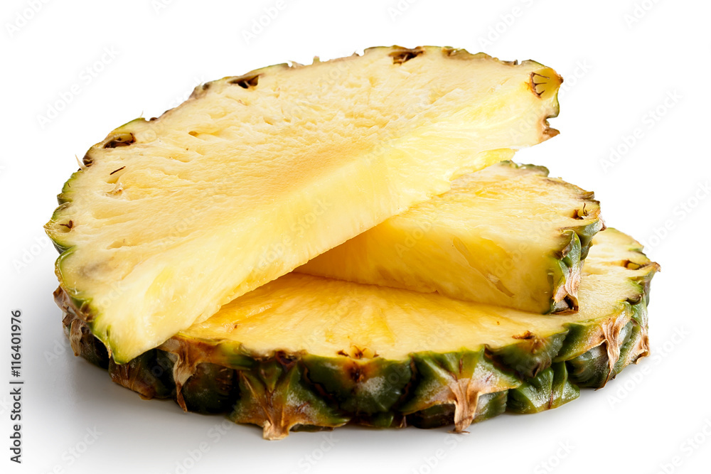 Round pineapple slice and two halves with skin isolated on white Round pineapple slice and two halves with skin isolated on white