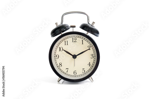 Isolated black vintage alarm clock on white background