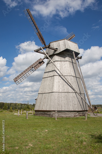 windmill against cloudy sky