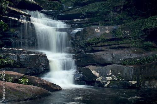 beautiful waterfall with dark toned  vignette corner