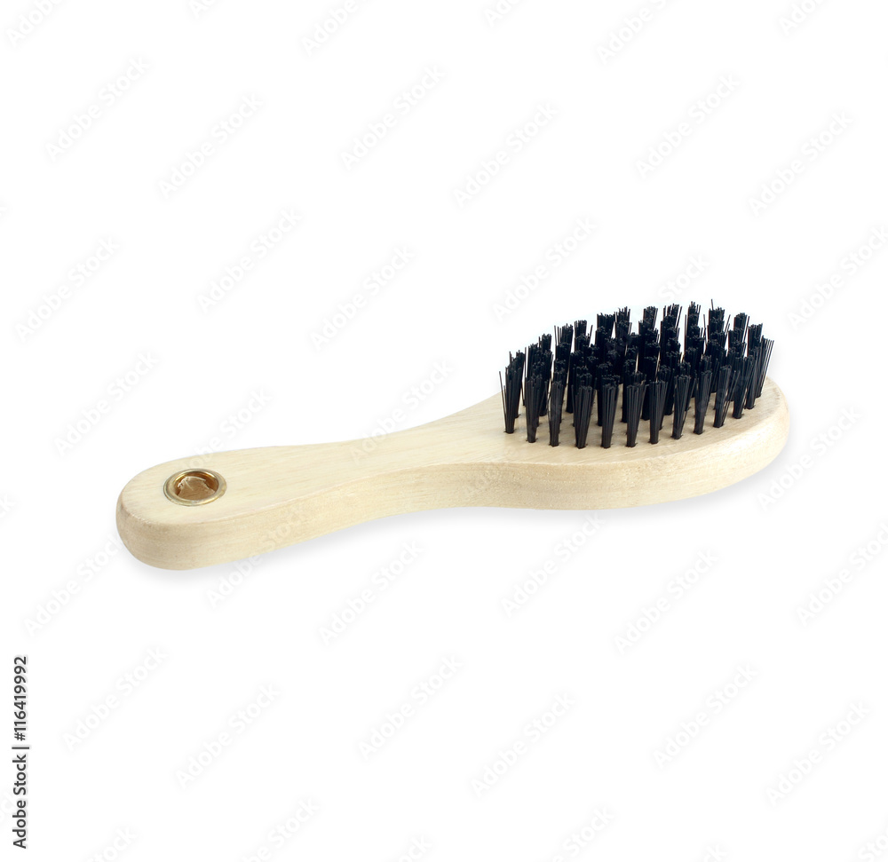 Comb wooden handle on a white background Comb wooden handle on a white background