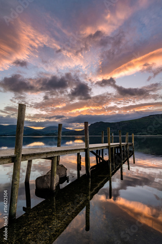 Dramatic sunrise over Brandlehow Jetty in the Lake District, UK. photo