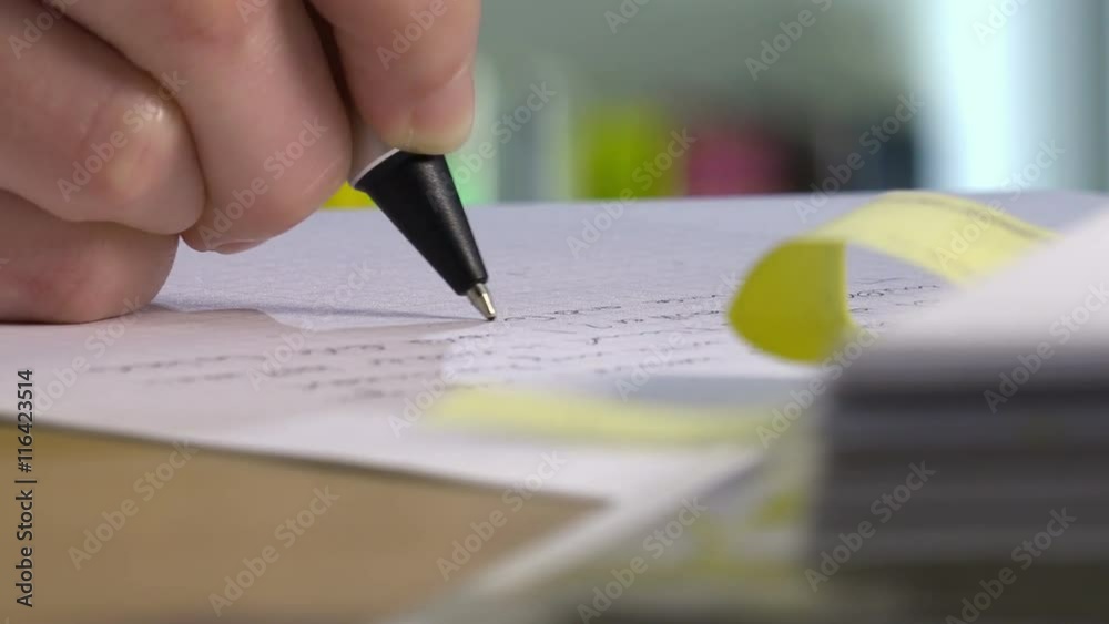 woman handwriting sitting at the desk and using a pen: businesswoman or student
woman handwriting sitting at the desk and using a pen: businesswoman or student