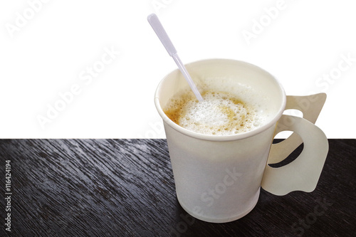 Hot coffee cappuccino in disposable paper coffee cup with plasti photo