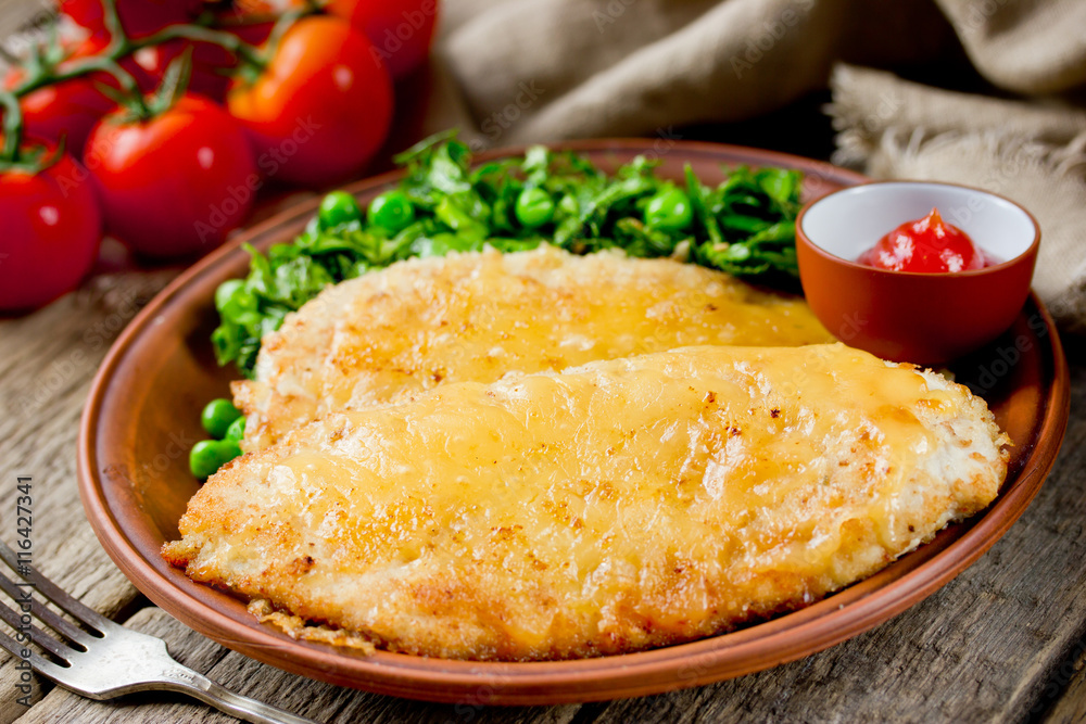 Chicken schnitzel with cheese crust for dinner Chicken schnitzel with cheese crust for dinner