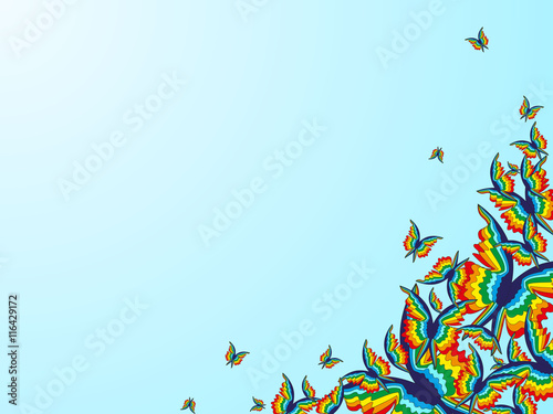 Abstract blue background with rainbow butterflies in the corner of the image