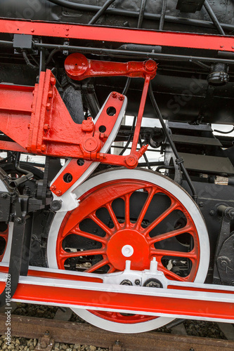 Detail and close up of huge wheels at one old german steam locom