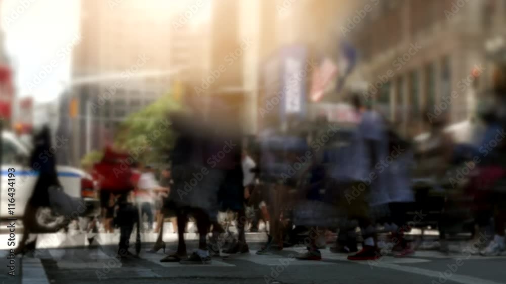 anonymous people walking on crowded street in the city. new york city background anonymous people walking on crowded street in the city. new york city background