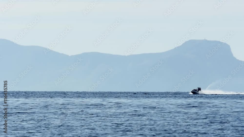 water sports recreational background. jet ski riding. beach fun activity water sports recreational background. jet ski riding. beach fun activity