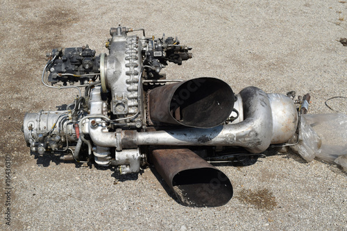 The helicopter engine which is pulled out outside photo