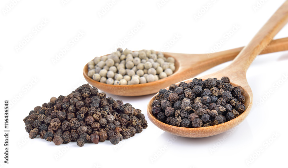 peppercorn in the wooden spoon on white background peppercorn in the wooden spoon on white background