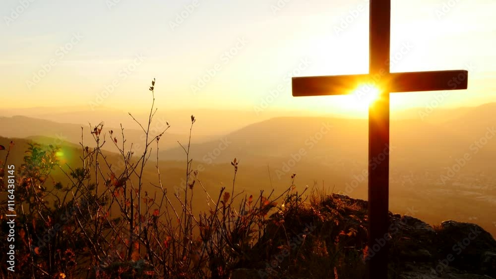 believe in faith symbol. rest in peace. silhouette of grave cross at sunset