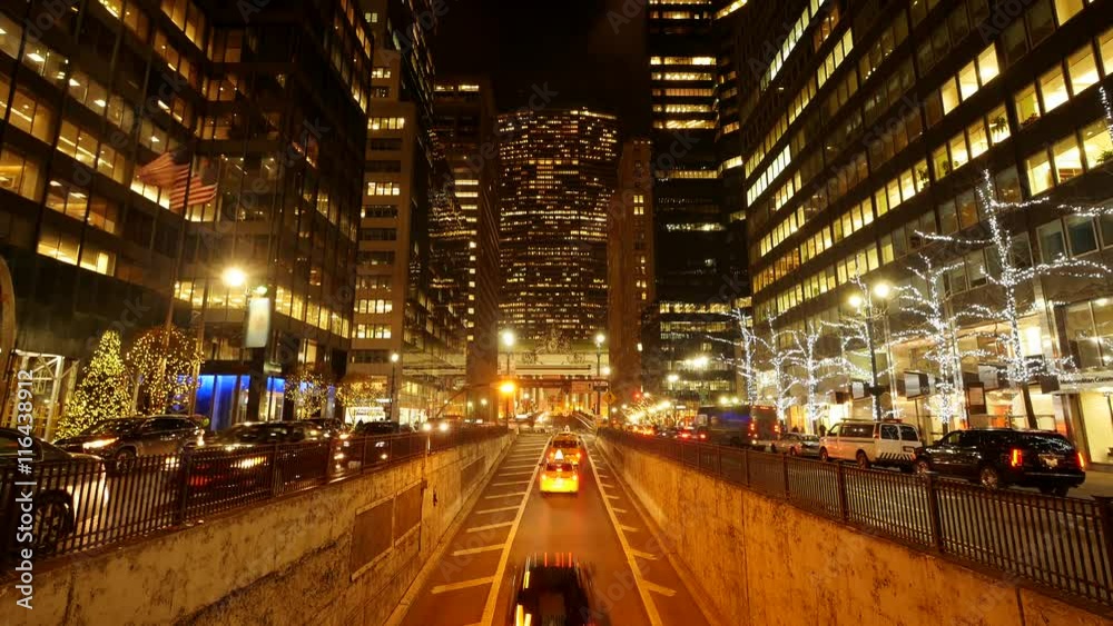 time lapse of traffic in the city at night. modern urban skyline buildings time lapse of traffic in the city at night. modern urban skyline buildings
