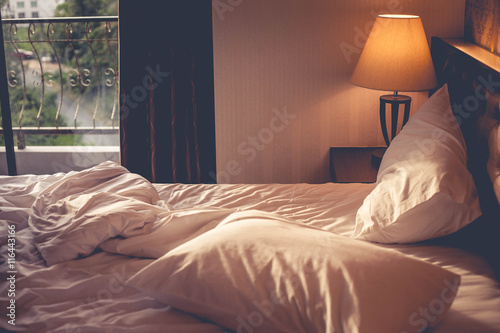 White and blue pillows on a bed Comfortable soft pillows on the bed
