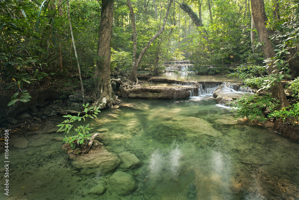 Obraz premium waterfall in deep forest on mountain