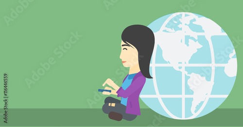Businessman sitting near Earth globe.