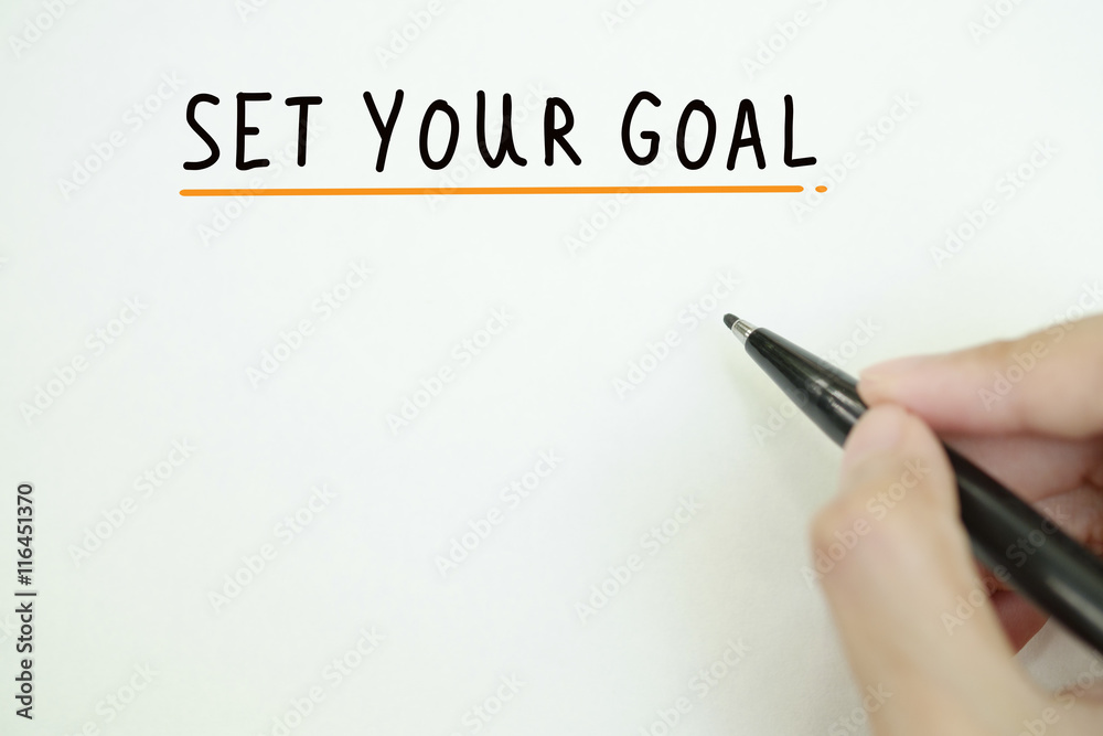 hand writing set your goal text on paper , business idea , busin hand writing set your goal text on paper , business idea , busin