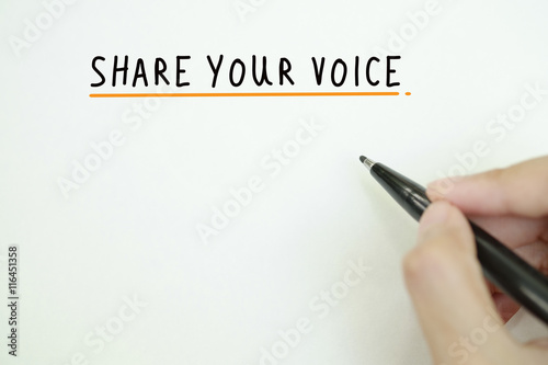 hand writing share your voice text on paper , business idea ,