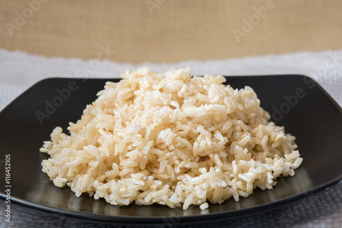 brown Rice on black plate